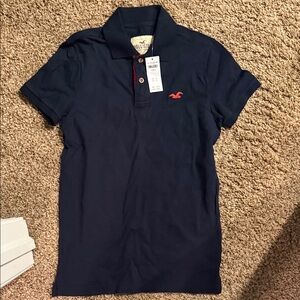 Hollister Men's Dark Blue Polo with Red Logo
